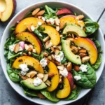 Summer Peach Spinach Salad with Avocado, Toasted Almonds + Goat Cheese
