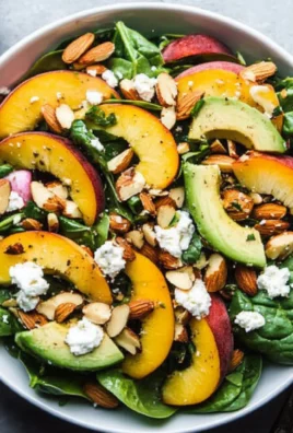 Summer Peach Spinach Salad with Avocado, Toasted Almonds + Goat Cheese