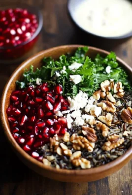 Pomegranate, Kale, and Wild Rice Salad with Walnuts and Feta