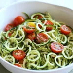 Raw Spiralized Zucchini Noodles with Tomatoes and Pesto