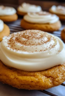 Pumpkin Sugar Cookies with Cream Cheese Frosting